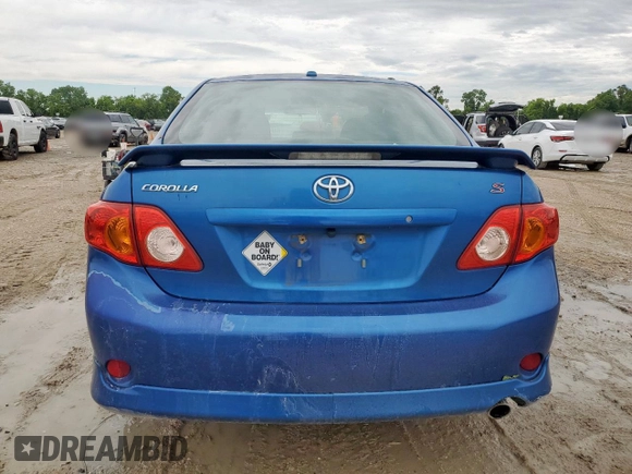 2010 Toyota Corolla with VIN 2T1BU4EE5AC498504, listed as a Copart auction lot 57043515 with 128,651 mi miles and Salvage title. Bid and sale history available at DreamBid. Image 6.