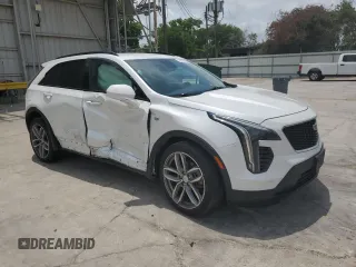 2020 Cadillac XT4 FWD Sport with VIN 1GYFZER49LF123830, listed as a Copart auction lot 55737985 with 98,871 mi miles and Salvage title. Bid and sale history available at DreamBid. Image 4.