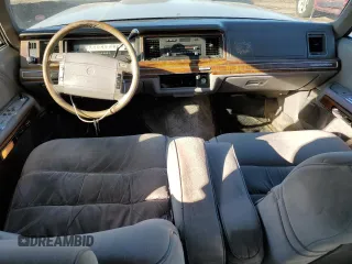 1991 Mercury Grand Marquis z VIN 2MECM74F4MX647208, wystawiony jako Copart lot #48439705 z przebiegiem 99 952 mil mil oraz Tytuł czysty. Historia ofert i sprzedaży dostępna na DreamBid. Obrazek 8.