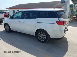 2021 Kia Sedona LX with VIN KNDMB5C12M6661917, listed as a IAAI auction lot 42129682 with 80,321 mi miles and . Bid and sale history available at carsss.com. Image 3.