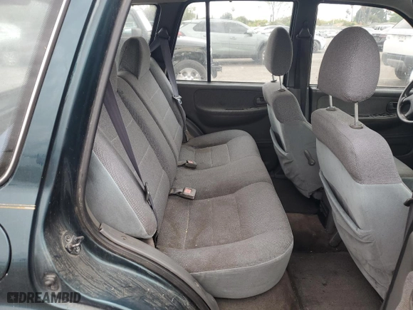 2001 Kia Sportage with VIN KNDJB723615696057, listed as a Copart auction lot 53584345 with 107,965 mi miles and Clean Title. Bid and sale history available at carsss.com. Image 10.