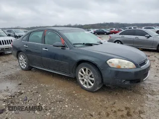 2014 Chevrolet Impala LTZ with VIN 2G1WC5E32E1110490, listed as a Copart auction lot 51873165 with 162,790 mi miles and Salvage Title. Bid and sale history available at DreamBid. Image 4.