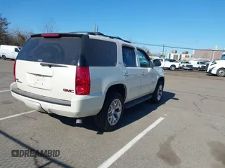 2009 GMC Yukon SLT 4SB with VIN 1GKFK33079R251967, listed as a IAAI auction lot 41901508 with 186,900 mi miles and . Bid and sale history available at DreamBid. Image 4.