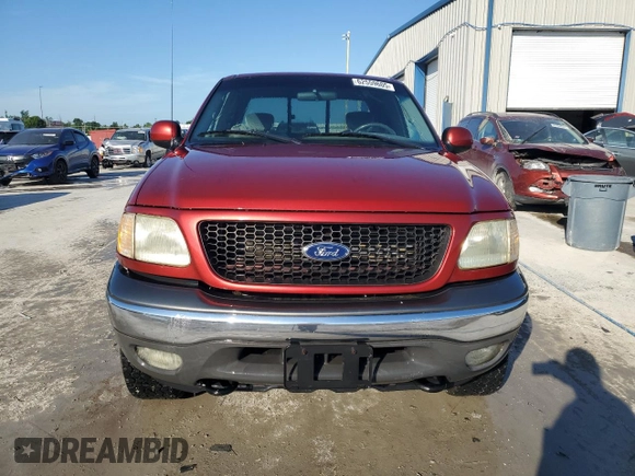 2002 Ford F-150 XL with VIN 1FTRX18L82NA54692, listed as a Copart auction lot 62559605 with 216,350 mi miles and Salvage title. Bid and sale history available at DreamBid. Image 5.
