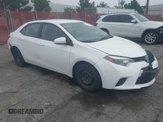 2015 Toyota Corolla L z VIN 5YFBURHE4FP204526, wystawiony jako IAAI lot #42503462 z przebiegiem 143 684 mil mil oraz . Historia ofert i sprzedaży dostępna na DreamBid. Obrazek 1.