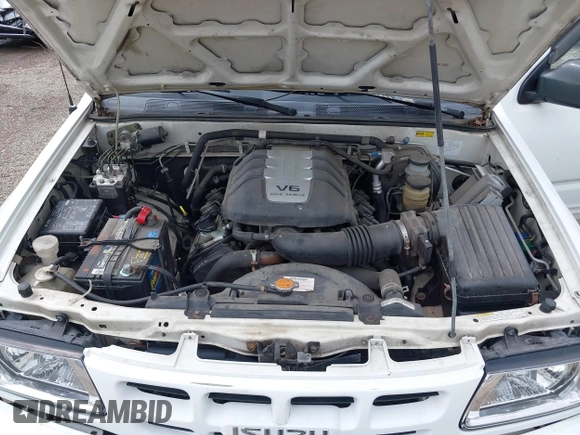 2000 Isuzu Rodeo z VIN 4S2DM58W6Y4312571, wystawiony jako IAAI lot #42253955 z przebiegiem 84 517 mil mil oraz . Historia ofert i sprzedaży dostępna na DreamBid. Obrazek 10.