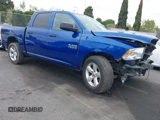 2015 Ram 1500 Express z VIN 1C6RR6KG0FS762887, wystawiony jako IAAI lot #42047359 z przebiegiem 146 963 mil mil oraz . Historia ofert i sprzedaży dostępna na DreamBid. Obrazek 1.