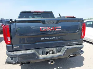 2019 GMC Sierra 1500 Denali z VIN 1GTU9FEL5KZ387012, wystawiony jako IAAI lot #42002743 z przebiegiem 124 718 mil mil oraz . Historia ofert i sprzedaży dostępna na DreamBid. Obrazek 16.