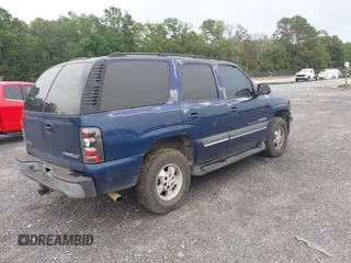 2003 Chevrolet Tahoe LS with VIN 1GNEC13Z13J117508, listed as a IAAI auction lot 42654839 with 270,213 mi miles and . Bid and sale history available at DreamBid. Image 4.