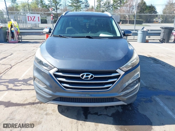 2017 Hyundai Tucson Value with VIN KM8J33A25HU402366, listed as a IAAI auction lot 41814426 with 117,669 mi miles. Bid and sale history available at carsss.com. Image 12.