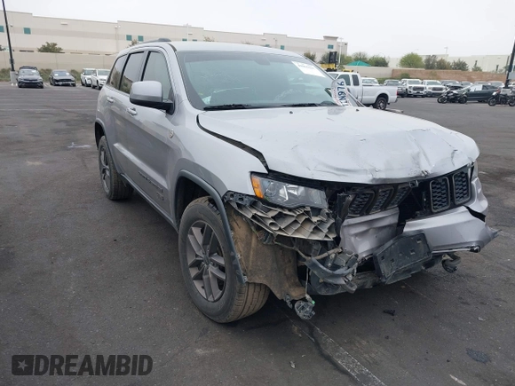 2016 Jeep Grand Cherokee Laredo z VIN 1C4RJFAG3GC457431, wystawiony jako IAAI lot #41993167 z przebiegiem 61 427 mil mil oraz . Historia ofert i sprzedaży dostępna na DreamBid. Obrazek 1.