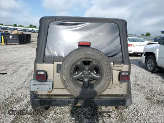 2003 Jeep Wrangler X с VIN 1J4FA39S03P349713, выставлен на аукционе Copart как лот 55768995 с пробегом 187 266 миль миль и Списание • Salvage title. История ставок и продаж доступна на DreamBid. Изображение 6.
