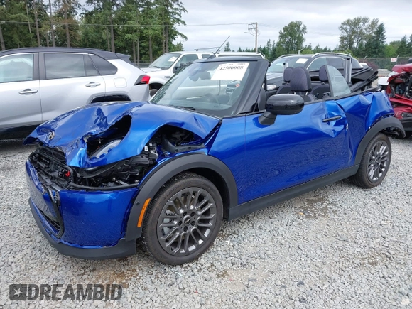 2025 MINI Convertible with VIN WMW23GX01S2X08664, listed as a IAAI auction lot 42506008 with 1,641 mi miles and . Bid and sale history available at DreamBid. Image 18.