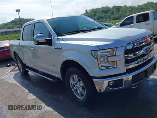 2015 Ford F-150 XLT with VIN 1FTEW1EG8FKE61864, listed as a IAAI auction lot 42120436 with 129,448 mi miles and . Bid and sale history available at DreamBid. Image 1.