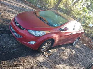 2012 Hyundai Elantra GLS with VIN KMHDH4AE7CU457604, listed as a IAAI auction lot 41993478 with 87,551 mi miles. Bid and sale history available at carsss.com. Image 2.