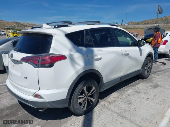 2016 Toyota RAV4 XLE with VIN JTMWFREV5GJ098870, listed as a IAAI auction lot 41878605 with 109,996 mi miles. Bid and sale history available at carsss.com. Image 13.