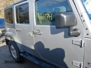 2015 Jeep Wrangler Unlimited Sport with VIN 1C4BJWDG4FL732123, listed as a IAAI auction lot 41864714 with 142,382 mi miles. Bid and sale history available at carsss.com. Image 13.