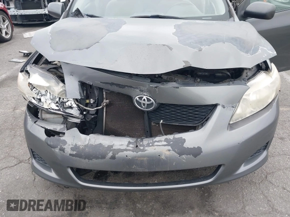 2009 Toyota Corolla with VIN JTDBL40E899066243, listed as a IAAI auction lot 41884292 with 219,338 mi miles. Bid and sale history available at carsss.com. Image 6.
