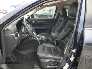 2021 Mazda CX-5 Grand Touring z VIN JM3KFBDM5M0464611, wystawiony jako Copart lot #62829065 z przebiegiem 20 525 mil mil oraz Nie do naprawy • Non repairable. Historia ofert i sprzedaży dostępna na DreamBid. Obrazek 7.