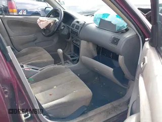 1998 Toyota Corolla VE with VIN 1NXBR12E7WZ070248, listed as a IAAI auction lot 41792397 with Not provided miles and . Bid and sale history available at DreamBid. Image 5.