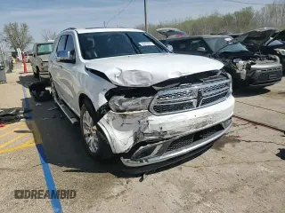 2016 Dodge Durango Citadel z VIN 1C4RDJEG7GC449465, wystawiony jako Copart lot #53279635 z przebiegiem 138 930 mil mil oraz Szkoda całkowita • Salvage title. Historia ofert i sprzedaży dostępna na DreamBid. Obrazek 13.
