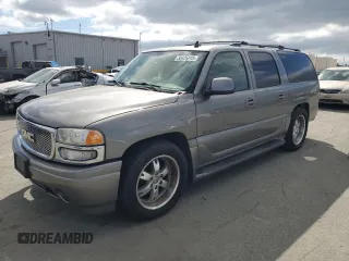 2006 GMC Yukon XL Denali with VIN 1GKFK66UX6J135785, listed as a Copart auction lot 50426245 with 221,095 mi miles and Salvage Title. Bid and sale history available at carsss.com. Image 1.