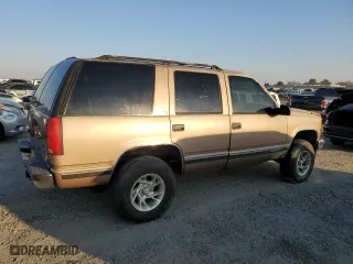 1996 Chevrolet Tahoe with VIN 1GNEK13R2TJ354351, listed as a Copart auction lot 43276385 with 2,526,567 mi miles and Salvage Title. Bid and sale history available at carsss.com. Image 3.