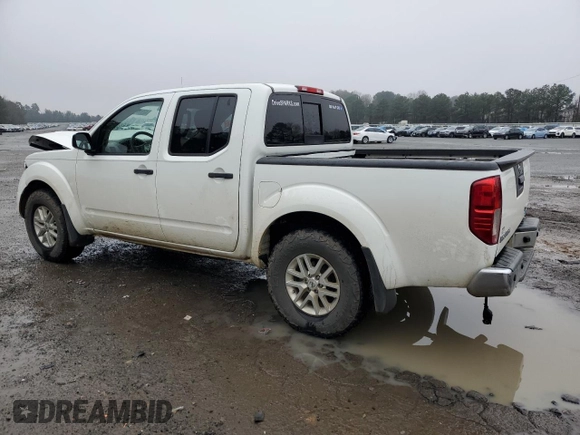 2019 Nissan Frontier Pro-4X with VIN 1N6DD0EV9KN796759, listed as a Copart auction lot 42917375 with 135,182 mi miles and Salvage title. Bid and sale history available at DreamBid. Image 2.