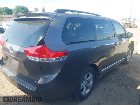 2014 Toyota Sienna LE AAS with VIN 5TDKK3DC0ES498732, listed as a IAAI auction lot 42077044 with 189,745 mi miles and . Bid and sale history available at carsss.com. Image 4.