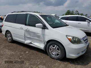 2005 Honda Odyssey EX-L with VIN 5FNRL38655B022447, listed as a Copart auction lot 50907325 with 170,604 mi miles and Salvage Title. Bid and sale history available at carsss.com. Image 4.
