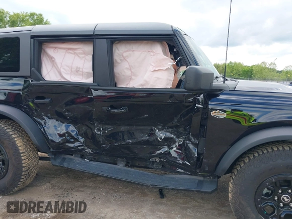 2024 Ford Bronco Wildtrak with VIN 1FMEE2BP1RLA75293, listed as a IAAI auction lot 42199529 with 6,466 mi miles and . Bid and sale history available at DreamBid. Image 6.