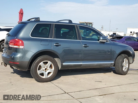 2005 Volkswagen Touareg 4.2L V8 z VIN WVGZM77L55D061960, wystawiony jako Copart lot #75717614 z przebiegiem 188 101 mil mil oraz Szkoda całkowita • Salvage title. Historia ofert i sprzedaży dostępna na DreamBid. Obrazek 3.