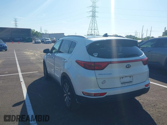 2017 Kia Sportage EX with VIN KNDPN3AC9H7077804, listed as a IAAI auction lot 42632194 with 134,027 mi miles and . Bid and sale history available at DreamBid. Image 3.