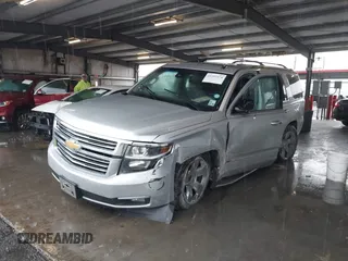 2015 Chevrolet Tahoe LTZ with VIN 1GNSCCKC5FR123099, listed as a IAAI auction lot 41391974 with Not provided miles and . Bid and sale history available at DreamBid. Image 6.