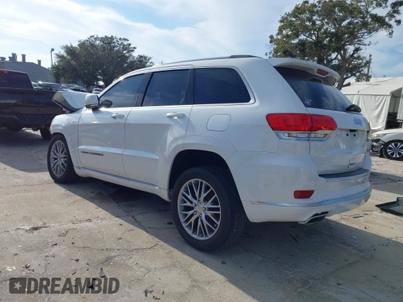2018 Jeep Grand Cherokee Summit with VIN 1C4RJEJG3JC394624, listed as a IAAI auction lot 41412939 with 80,180 mi miles and . Bid and sale history available at DreamBid. Image 3.