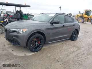 2021 Alfa Romeo Stelvio Ti with VIN ZASPAKBN9M7D18770, listed as a IAAI auction lot 41520181 with 64,709 mi miles. Bid and sale history available at carsss.com. Image 19.
