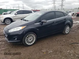 2016 Ford Fiesta Titanium z VIN 3FADP4CJ1GM146770, wystawiony jako Copart lot #54019864 z przebiegiem 153 418 mil mil oraz Szkoda całkowita • Salvage title. Historia ofert i sprzedaży dostępna na DreamBid. Obrazek 1.