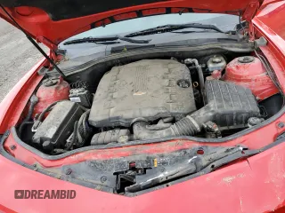 2013 Chevrolet Camaro LT z VIN 2G1FB1E31D9115191, wystawiony jako Copart lot #55069455 z przebiegiem 112 027 mil mil oraz Szkoda całkowita • Salvage title. Historia ofert i sprzedaży dostępna na DreamBid. Obrazek 11.