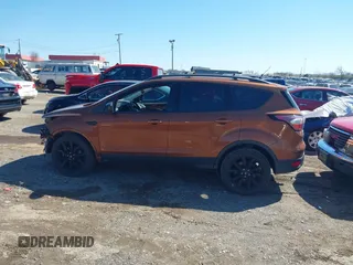 2017 Ford Escape SE with VIN 1FMCU0G97HUB49124, listed as a IAAI auction lot 41775132 with 103,069 mi miles. Bid and sale history available at carsss.com. Image 15.