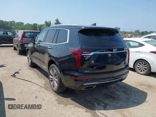 2021 Cadillac XT6 Premium Luxury with VIN 1GYKPDRS0MZ153523, listed as a IAAI auction lot 42770895 with 19,843 mi miles and . Bid and sale history available at DreamBid. Image 3.