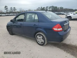 2009 Nissan Versa 1.8 S with VIN 3N1BC11E49L500200, listed as a Copart auction lot 87227464 with 215,170 mi miles and Salvage Title. Bid and sale history available at carsss.com. Image 2.