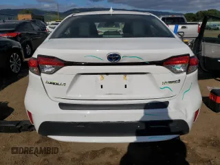 2022 Toyota Corolla Hybrid LE with VIN JTDEAMDE4NJ042155, listed as a Copart auction lot 53845215 with 28,254 mi miles and Salvage Title. Bid and sale history available at carsss.com. Image 6.