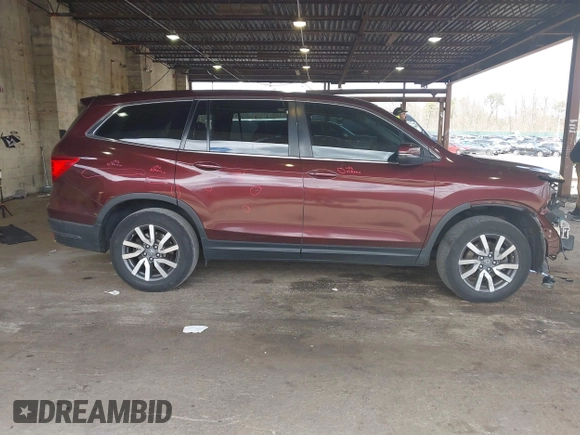 2020 Honda Pilot EX z VIN 5FNYF6H34LB021295, wystawiony jako IAAI lot #42051719 z przebiegiem 89 277 mil mil oraz . Historia ofert i sprzedaży dostępna na DreamBid. Obrazek 14.