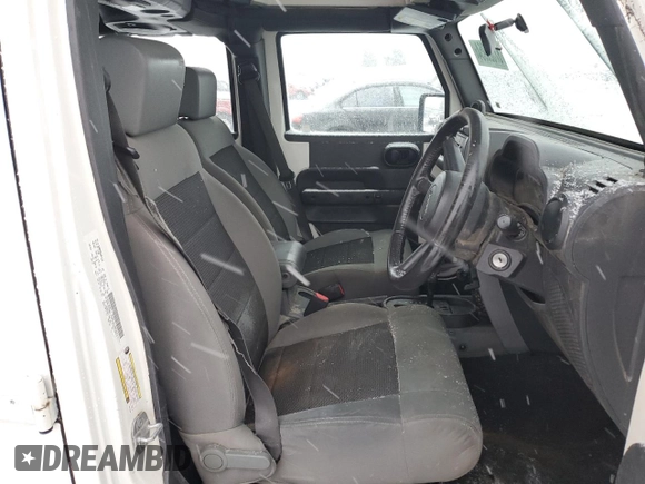 2009 Jeep Wrangler Unlimited X with VIN 1J4GZ39169L717946, listed as a Copart auction lot 87325954 with 0 mi miles and Salvage Title. Bid and sale history available at carsss.com. Image 7.