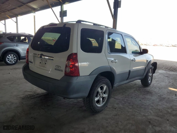 2006 Mazda Tribute i with VIN 4F2YZ02Z16KM17645, listed as a Copart auction lot 80996344 with 175,970 mi miles and Salvage Title. Bid and sale history available at carsss.com. Image 3.