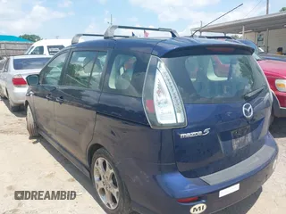 2009 Mazda 5 Touring with VIN JM1CR29L890340411, listed as a IAAI auction lot 42270019 with 150,892 mi miles and . Bid and sale history available at DreamBid. Image 3.