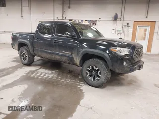 2020 Toyota Tacoma SR5 z VIN 5TFCZ5AN6LX226243, wystawiony jako IAAI lot #41391930 z przebiegiem 106 134 mil mil oraz . Historia ofert i sprzedaży dostępna na DreamBid. Obrazek 1.