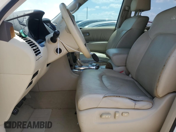 2012 Infiniti QX56 7-passenger with VIN JN8AZ2NF9C9517580, listed as a Copart auction lot 66382334 with 176,182 mi miles and Clean Title. Bid and sale history available at carsss.com. Image 7.