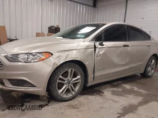 2018 Ford Fusion S z VIN 3FA6P0UU5JR100377, wystawiony jako IAAI lot #41300284 z przebiegiem 108 936 mil mil oraz . Historia ofert i sprzedaży dostępna na DreamBid. Obrazek 6.