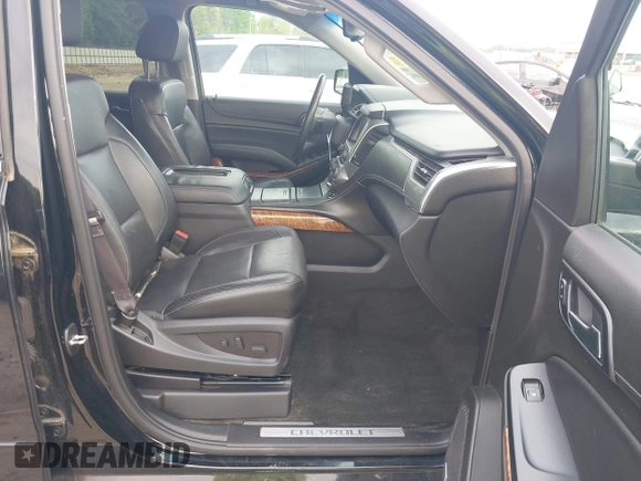 2015 Chevrolet Suburban LTZ with VIN 1GNSCKKCXFR731873, listed as a IAAI auction lot 42069917 with 108,963 mi miles and . Bid and sale history available at DreamBid. Image 5.